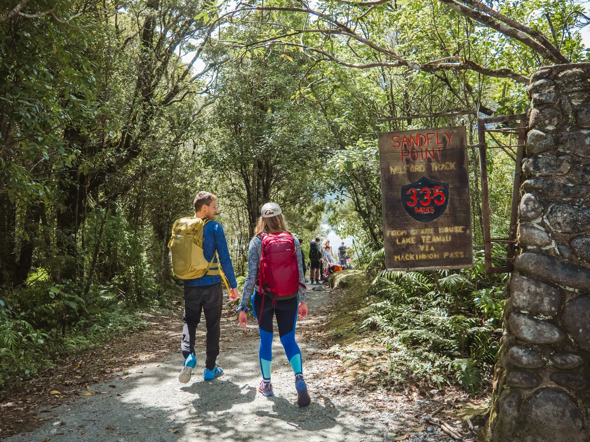 Hikers reaching Sandfly Point, Milford Track