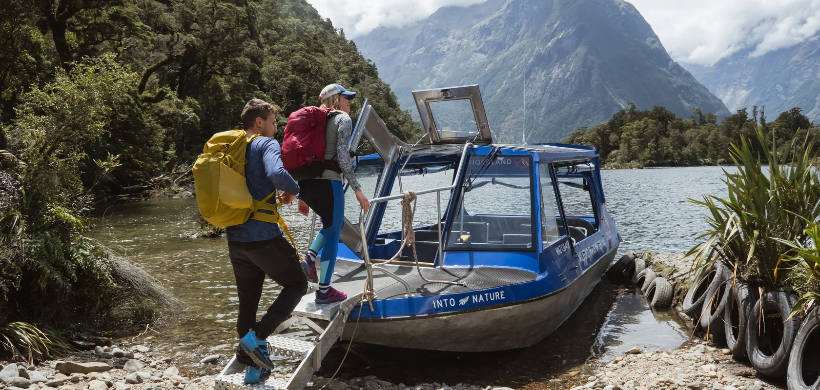 Hikers boarding the Water Taxi at Sandfly Point, Milford Sound