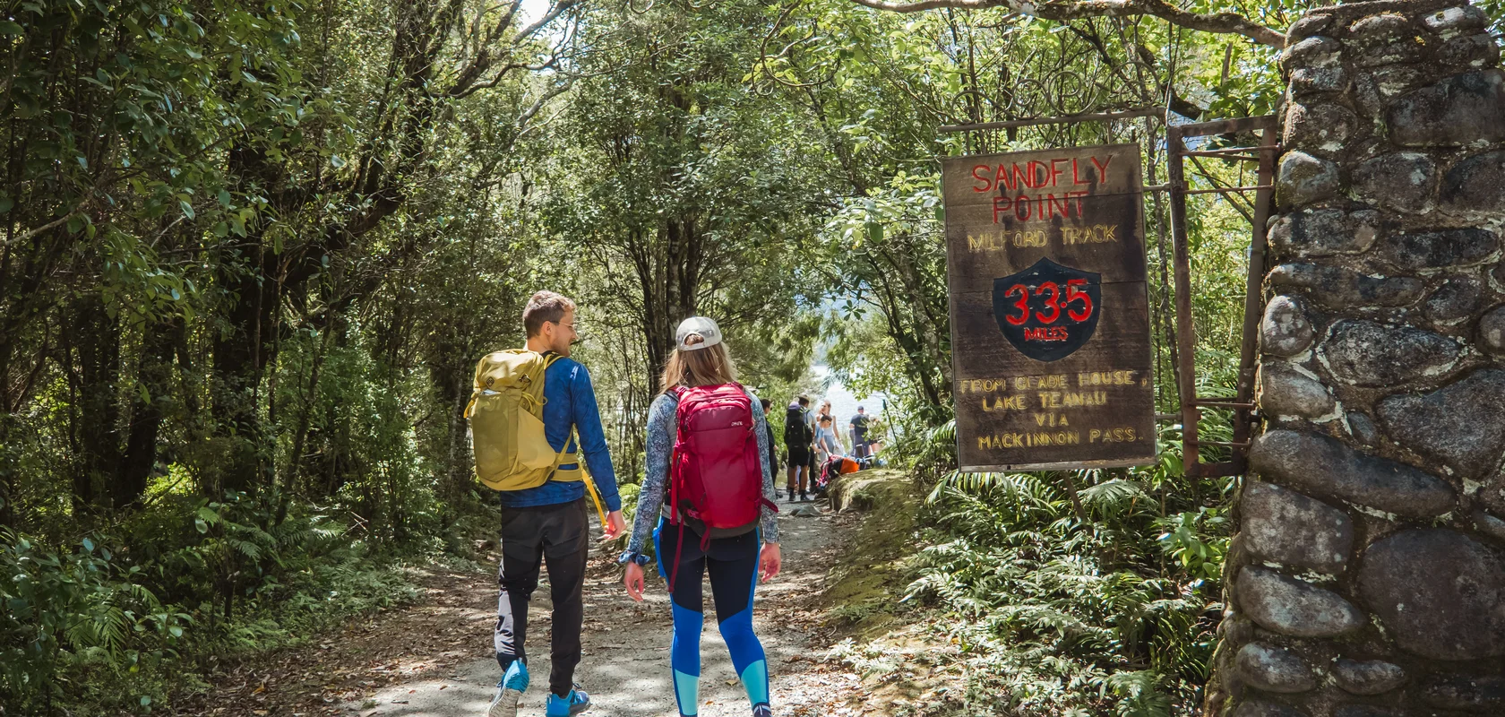 Hikers reaching Sandfly Point, Milford Track